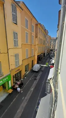a view of a city street with buildings at Le Calisson, magnifique studio plein centre d'Aix in Aix-en-Provence