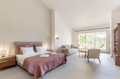 a swimming pool with lounge chairs and a house at LOasis de Gordes Provence Pool Villa Retreat in Gordes