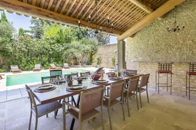 a living room with a couch and a tv at LOasis de Gordes Provence Pool Villa Retreat in Gordes