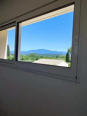 a window in a room with a view at Le Picholine in Mazan