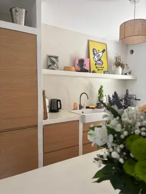 a kitchen with a sink and a counter at Lourmarin Family Country House in Cadenet