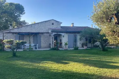 a white house with a yard in front of it at Villa Caromb - Mont Ventoux Garden - by TGB in Caromb