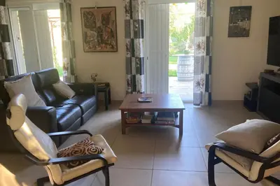 a living room with a couch and a coffee table at Villa Caromb - Mont Ventoux Garden - by TGB in Caromb