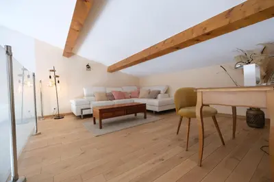 a living room with a couch and a table at Luxury air-conditioned villa pool views Aix-en-Provence LS7-457 in Saint-Cannat