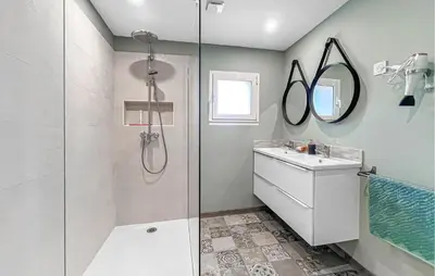 a bathroom with a shower and a sink at Proche Alpilles in Eyragues
