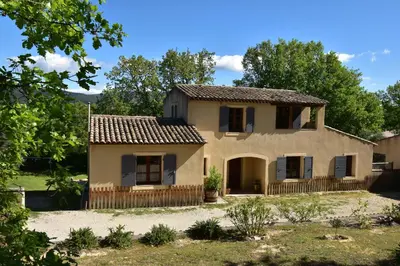 a house in the middle of a garden at Les Chambres du Luberon & Table d'hôtes in Lauris