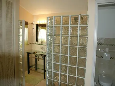 a bathroom with a shower with a toilet and a sink at Villa in Reillanne with Private Pool in Reillanne