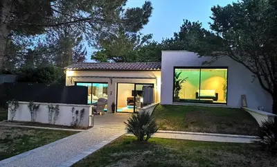 a home with a view of a yard at Cocon D'amour En Luberon - Chambre Spa a proximite de l'Isle sur la Sorgue in LʼIsle-sur-la-Sorgue