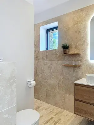 a white bedroom with a bed and large windows at Villa With Panoramic Views And Pool In Gordes in Gordes