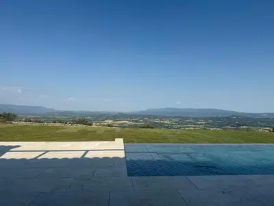a bathroom with a sink and a mirror at Villa With Panoramic Views And Pool In Gordes in Gordes