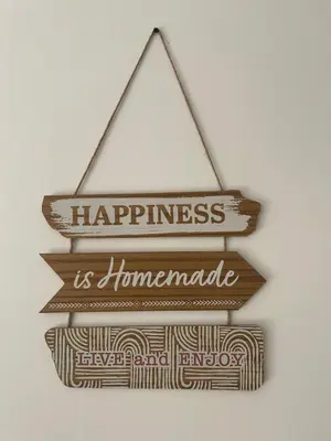 a wooden sign that reads happiness is homemade at Suite jacuzzi in Aix-en-Provence