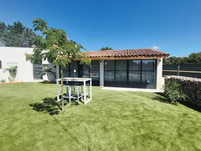 a house with a tree in the yard at Ô nuits de saint cannat in Saint-Cannat