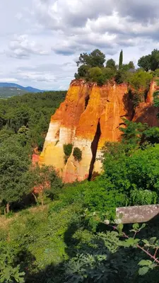 a rock formation with a bench in front of it at AAD maison de vacances avec piscine in LʼIsle-sur-la-Sorgue