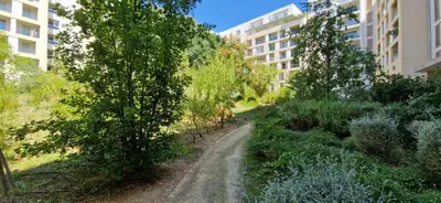 a dirt road in the middle of a building at Le Triton, new appartments near city center , parking , lift in Aix-en-Provence
