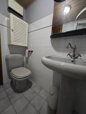 a bathroom with a toilet and a sink at Appartement Gîte d'Etape Vitrolles en Luberon in Vitrolles-en-Luberon