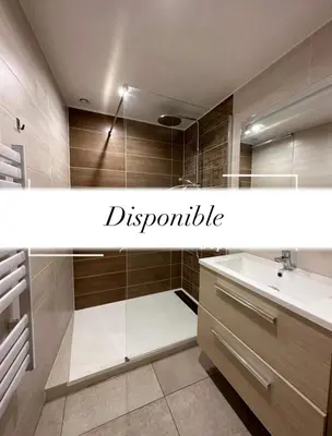 a bathroom with a tub and a sink and a mirror at Tiny House - Les Baïsses - Jardin Tropical in Lançon-Provence