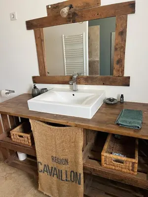 a bathroom with a sink and a mirror at House with a view of Luberon and a pool in Maubec