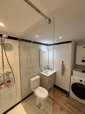 a bathroom with a toilet and a sink and a shower at Studio charmant centre historique au calme in Aix-en-Provence