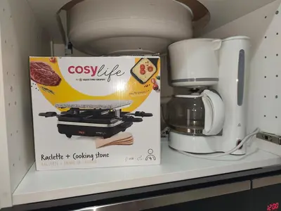a box sitting on a counter next to a mixer at Escapade dans le Luberon in Cavaillon