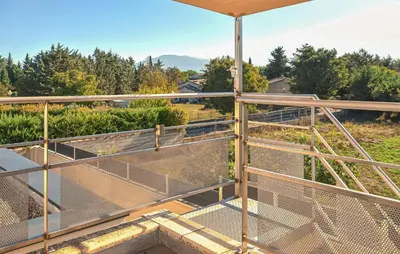 a view from the balcony of a house at Villa Avec Piscine Privée in Carpentras