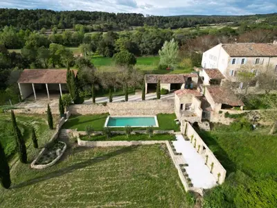 an aerial view of an estate with a swimming pool at Historic Mansion In Provence Vineyards in La Tour-dʼAigues