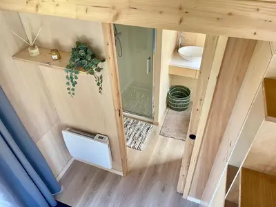 an overhead view of a tiny house with a door at Tiny House avec vue sur le rocher de Saignon, Luberon in Saignon