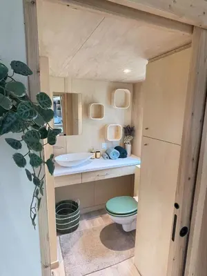 a kitchen counter with a box of items on it at Tiny House avec vue sur le rocher de Saignon, Luberon in Saignon