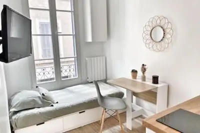 a small kitchen with a sink and a microwave at La Rotonde by Rentalaix in Aix-en-Provence