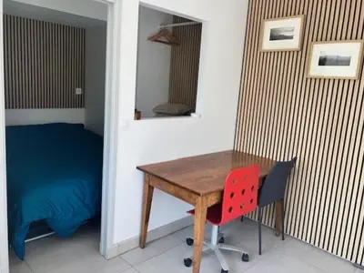 a kitchen with a sink and an open window at Appartement en Luberon in Pertuis