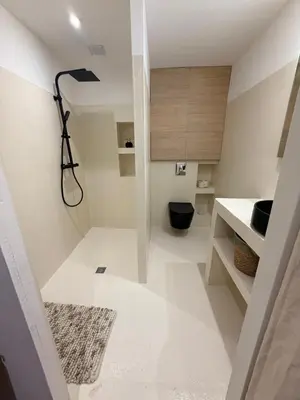 a bathroom with a sink and a toilet in a room at Le Clos d'AIX studio 1 in Aix-en-Provence