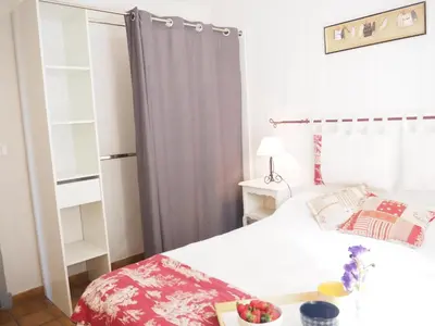 a bedroom with a bed with a bowl of fruit on it at Holiday Home in Provence near Mont Ventoux in Bédoin