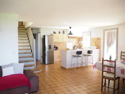 a kitchen and living room with a couch and a refrigerator at Holiday Home in Provence near Mont Ventoux in Bédoin