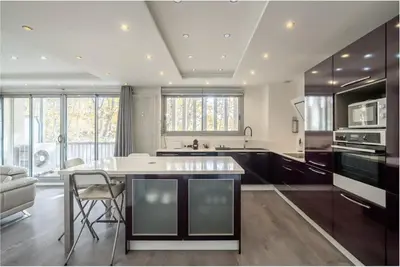 a large kitchen with a large island in a room at The 42 in Aix-en-Provence