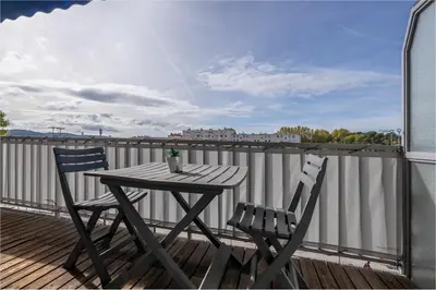 a table and two chairs on a balcony at The 42 in Aix-en-Provence