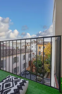 a balcony with a view of a building at 2 rooms apartment in the city center in Aix-en-Provence