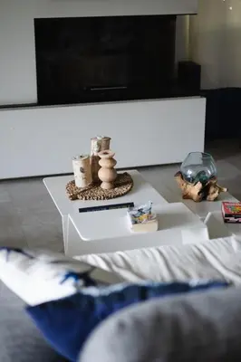 a white table with items on it in a living room at Estate in Provence in Aix-en-Provence