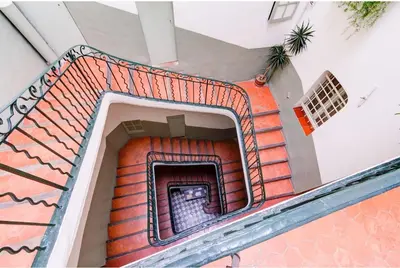 an overhead view of a building with a staircase at Aude Loft in Aix-en-Provence