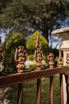 a close up of a wooden rail on a fence at Grand Cèdre in Aix-en-Provence