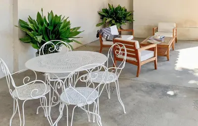 a white table and chairs in a room at Maison De Charme in Jonquerettes
