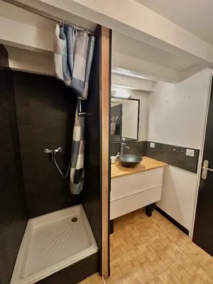 a bathroom with a sink and a mirror and a sink at Perle Aix en Provence centre ville in Aix-en-Provence