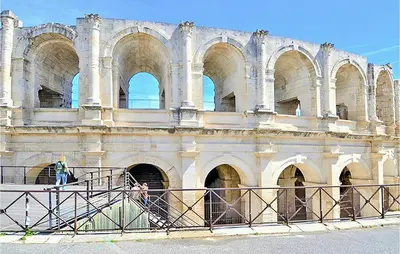 a large building with arches on the side of it at Awesome Home In Miramas With Swimming Pool in Miramas