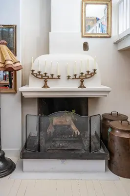 a fireplace with a cake on top of it at Signature Home Pool & Panoramic Terrace in Goult