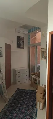 a room with a desk and a dresser and a window at T2 calme centre Aix Clim Fibre in Aix-en-Provence