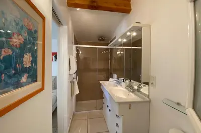 a bathroom with a sink and a shower at Family villa with garden and pool in LʼIsle-sur-la-Sorgue