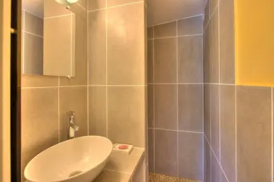 a bathroom with a toilet and a sink at Bergerie provencale, 4 personnes, piscine in Gordes