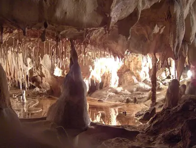 a cave with a person standing in the middle of it at Ventoux gîtes - appartements typiques avec vue sur le Mont Ventoux in Caromb