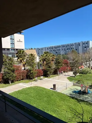 a building with an archway on the side of it at Calme T2, Wifi, Proche centre et sites culturels, Vue magnifique in Aix-en-Provence