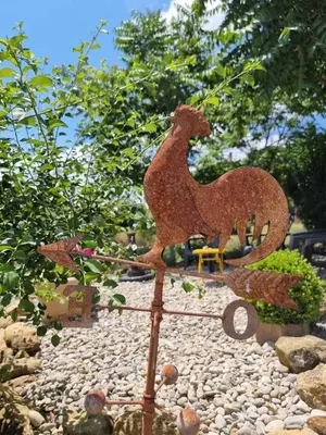 a statue of a horse sitting on top of a pile of rocks at Gîtes de la Coupière Le Laurier in Aubenas-les-Alpes