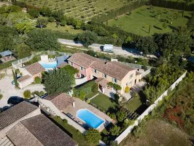 an aerial view of a house with a swimming pool at Holiday Home Die Gîtes de Bel-Air im Luberon in der Provence by Interhome in Les Taillades