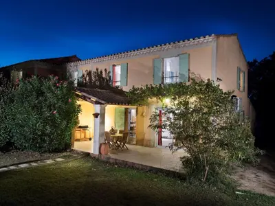 a large house with a yard at night at Holiday Home Die Gîtes de Bel-Air im Luberon in der Provence by Interhome in Les Taillades